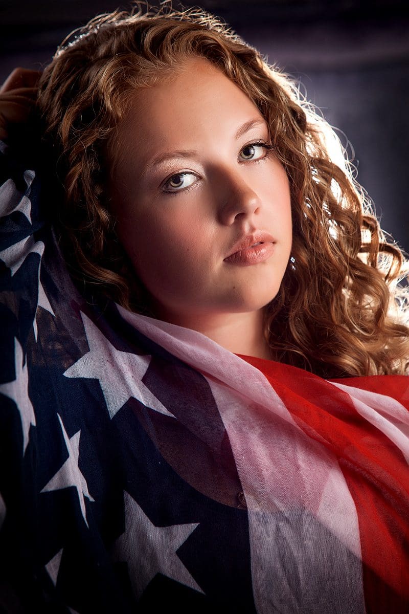 High School Senior Girl with american flag portrait